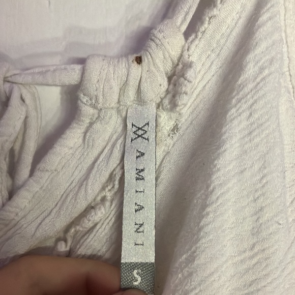 White cute summer shirt has 2 holes and one little non noticeable stain - Picture 2 of 6